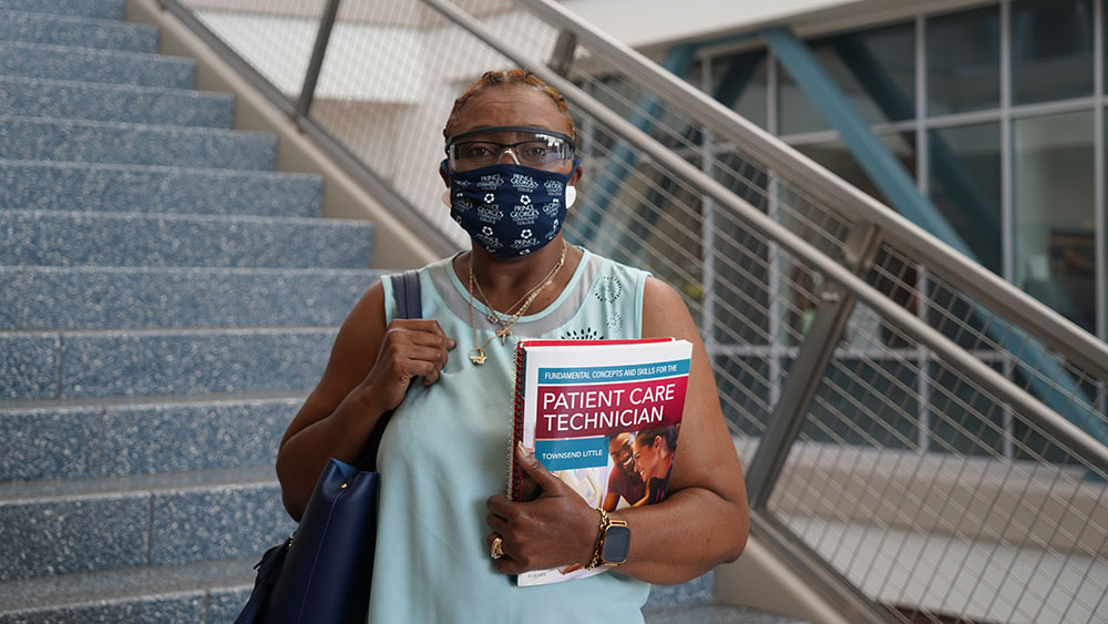 Student on campus with face mask