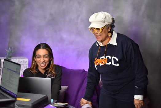 Miriam and a student at the PGCC TV studio.